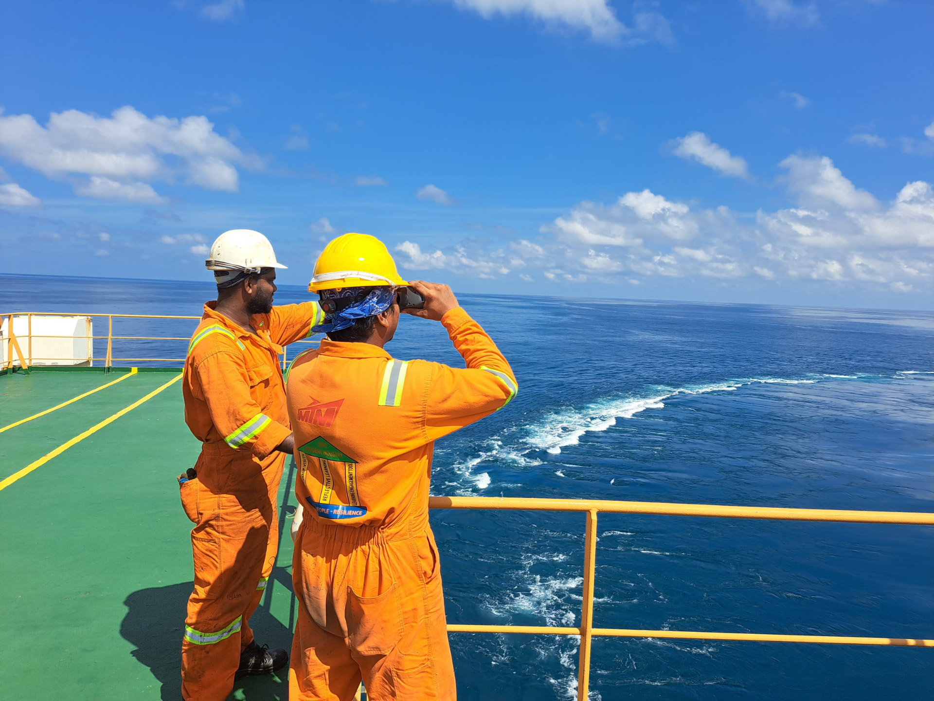 Awak kapal berjaga di geladak saat pelayaran